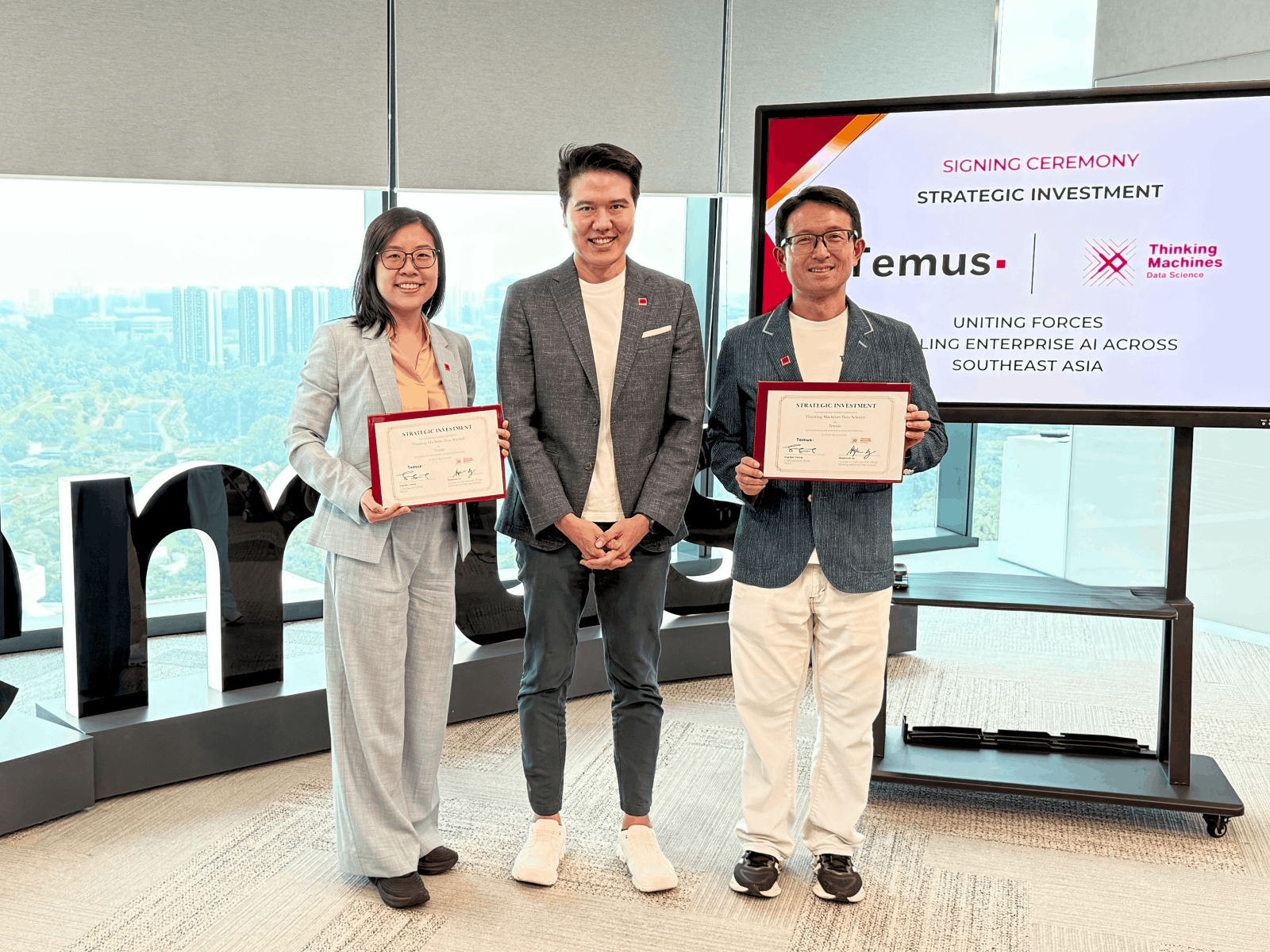 (Left to Right) Stephanie Sy, Managing Director, Applied AI & Data, Temus, Sng Ren Yeong, CEO, Temus, and Sutowo Wong, Managing Director, Applied AI & Data, Temus